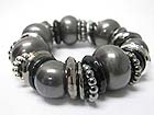 CRYSTAL RING AND MULTI METAL PART STRETCH BRACELET 