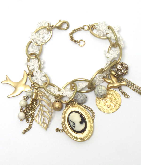 CAMEO AND MIXED VINTAGE CHARMS BRACELET