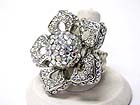 CRYSTAL STUD FLOWER TOP METAL STRETCH BAND RING