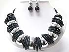 LARGE METAL BALL AND MULTI RING NECKLACE EARRING SET