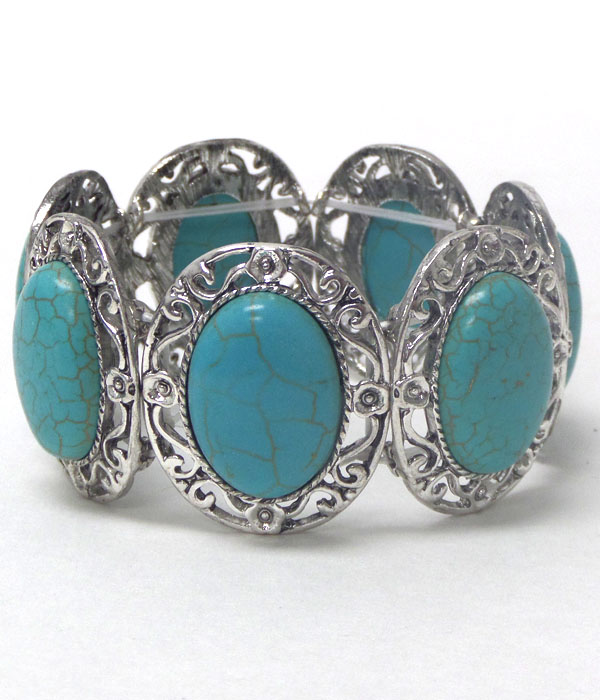 OVAL TURQUOISE AND METAL FILIGREE DISK STRETCH BRACELET