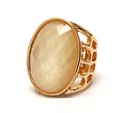 HAMMERED AND CUT OUT METAL AND ON CENTER OVAL FACET CUT GLASS RING