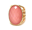 HAMMERED AND CUT OUT METAL AND ON CENTER OVAL FACET CUT GLASS RING