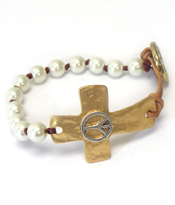 HAMMERED CROSS AND LEATHER AND PEARL BUTTON BRACELET