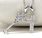 WHITE GOLD PLATING AND CRYSTAL DECO CROSS AND KEY PENDANT NECKLACE