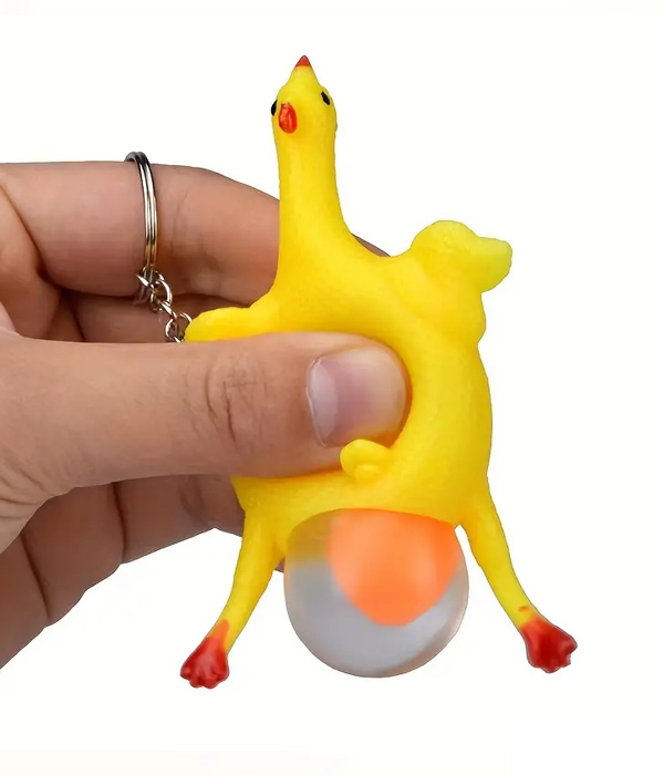 CHICKEN STRESS BALL AND KEYCHAIN - SQUEEZE THE CHICKEN TO LAY AN EGG