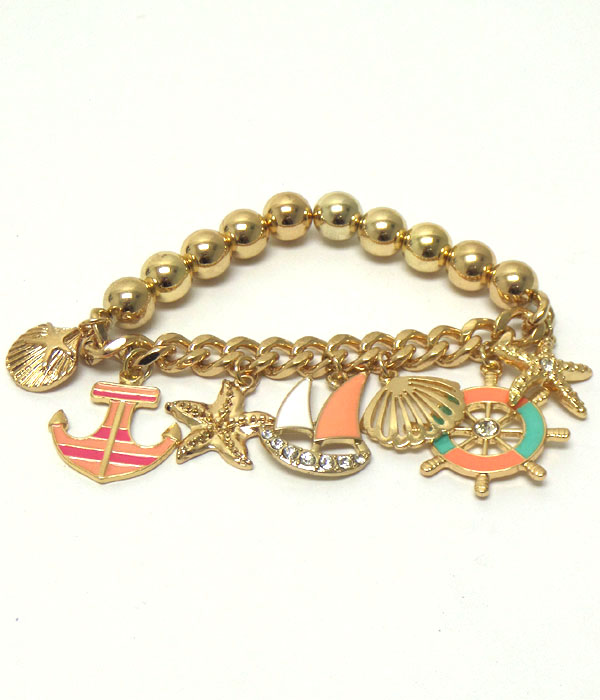 EPOXY AND CRYSTAL SAIL BOAT AND ANCHOR CHARM STRETCH BRACELET