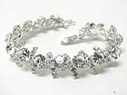 RHINESTONE AND FACET CRYSTAL LINK BRACELET