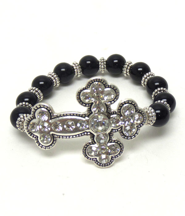 TEXTURED METAL CROSS WITH CRYSTALS ON JET BLACK BEADS STRETCH BRACELET