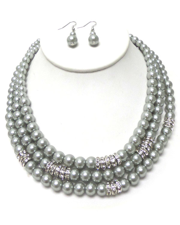 CRYSTAL RONDELLE AND 3 LAYERED PEARL NECKLACE EARRING SET