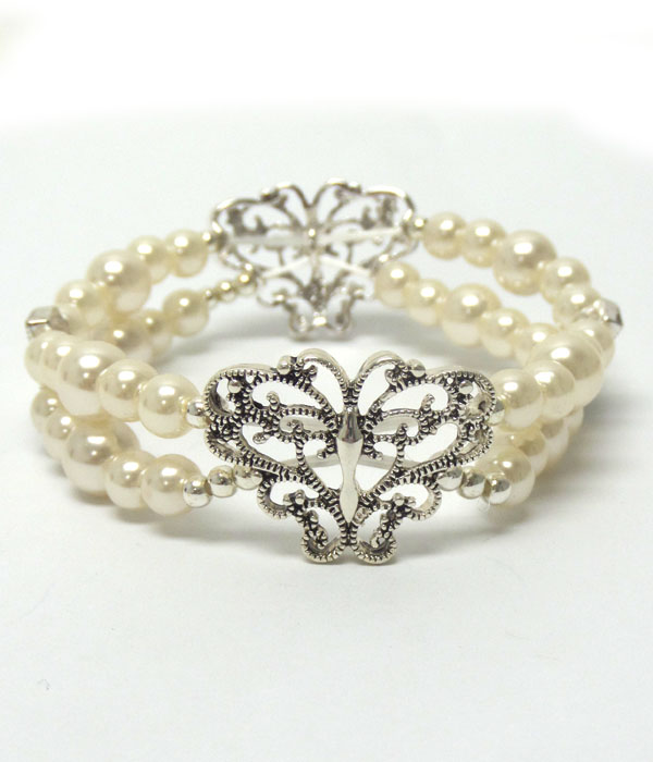 METAL FILIGREE BUTTERFLY AND DOUBLE STRETCH PEARL BRACELET