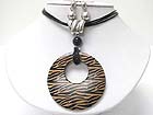 ANIMAL PRINT WOOD DONUT MEDALLION CORD NECKLACE EARRING SET