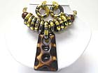 ETHNIC STYLE SNAKE CHAIN DONUT AND RESIN LARGE PENDANT NECKLACE EARRING SET?