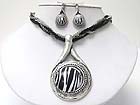 ANIMAL PRINT ROUND STONE PENDANT AND MULTI STRAND MIXED CHAIN NECKLACE EARRING SET