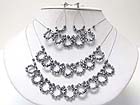THREE ROW FACET GLASS STONE DECO ROUND LINK NECKALCE EARRING SET