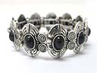 FORMICA STONE ANTIQUE METAL DISK LINK STRETCH BRACELET