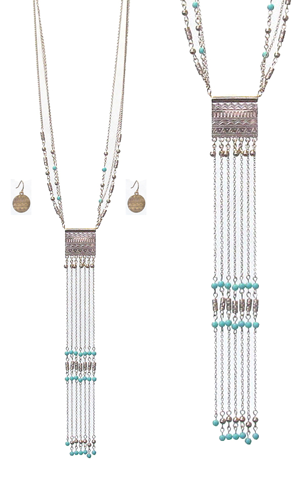 TEXTURED PENDANT AND LONG TASSEL NECKLACE SET