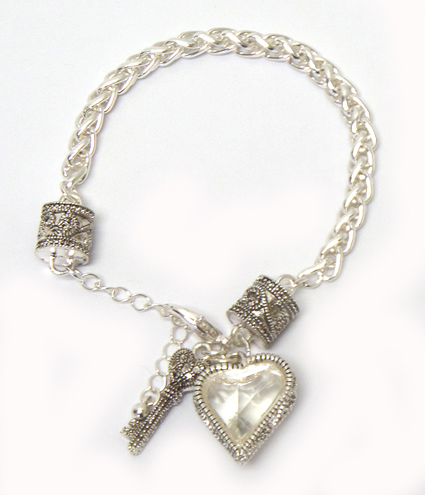 GLASS AND METAL CASTING HEART AND KEY CHARM BRACELET