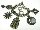 ANTIQUE STYLE CLOCK AND MULTI CHARM TOGGLE BRACELET