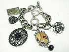 ANTIQUE STYLE MULTI CHARM TOGGLE BRACELET