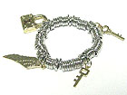 KEY AND LOCK AND WING CHARM METAL STRETCH BRACELET