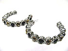 CRYSTAL LINK ARC EARRING