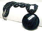 LARGE ACRYLIC ROUND PENDANT AND MULTI STRAND SEED BEADS NECKLACE SET