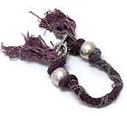 METAL CHAIN WITH CORD AND TWO METAL BALLS BRACELET