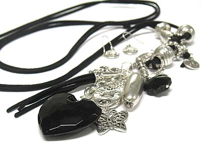 FACET CUT HEART GLASS STONE AND MULTI LONG CHARMS DOUBLE SUEDE CORD NECKLACE AND EARRING SET 