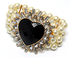 CRYSTAL GLASS HEART WITH TEARDROP GLASS AND THREE ROW PEARL STRETCH BRACELET
