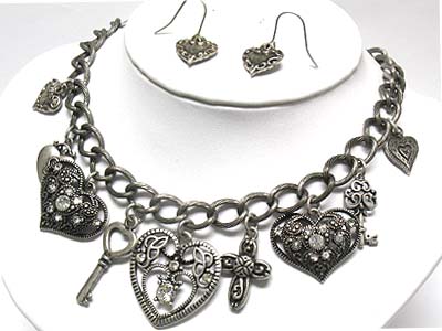 CRYSTAL STUD MULTI SHAPE AND SIZE HEART AND KEY AND CROSS CHARM NECKLACE AND EARRING SET