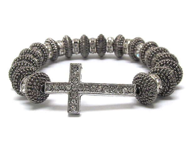 CRYSTAL METAL CROSS WITH MULTI RONDELLE CRYSTAL AND TEXTURED METAL BALLS ON STRETCH BARCELET
