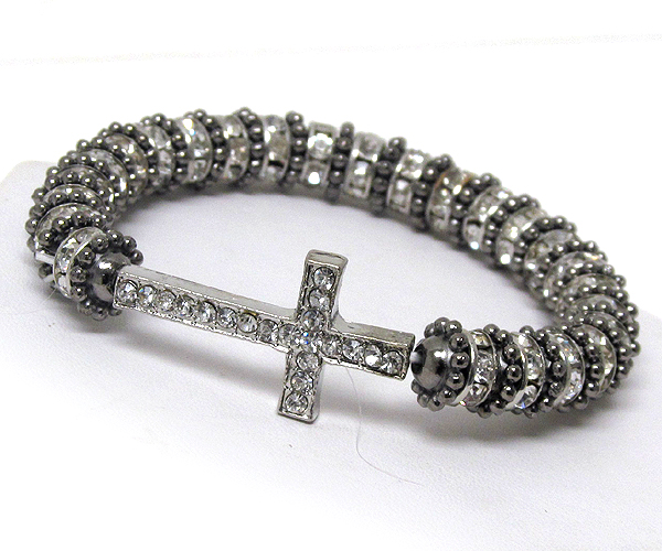 MULTI CRYSTAL RONDELL WITH TEXTURED RING AND CRYSTAL CROSS IN BETWEEN STRETCH BARCELET