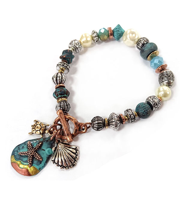 Patina and burnish tri tone retro vintage strtch bracelet -starfish and shell