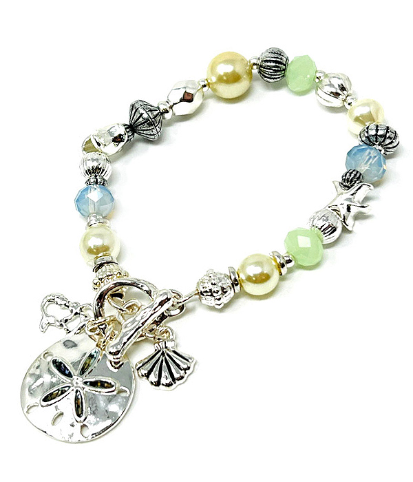 Sealife theme mixed bead and abalone pendant toggle bracelet - sand dollar