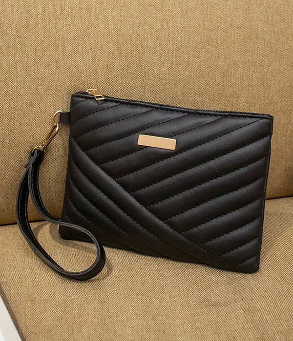 Quilted wristlet clutch bag