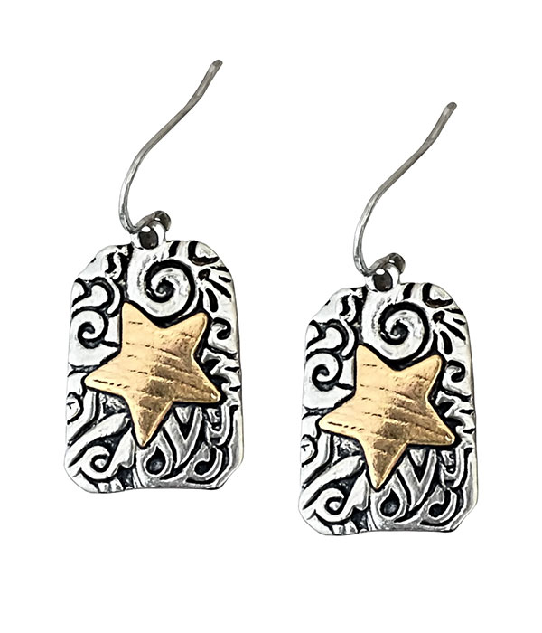 Vintage metal hand carved star earring