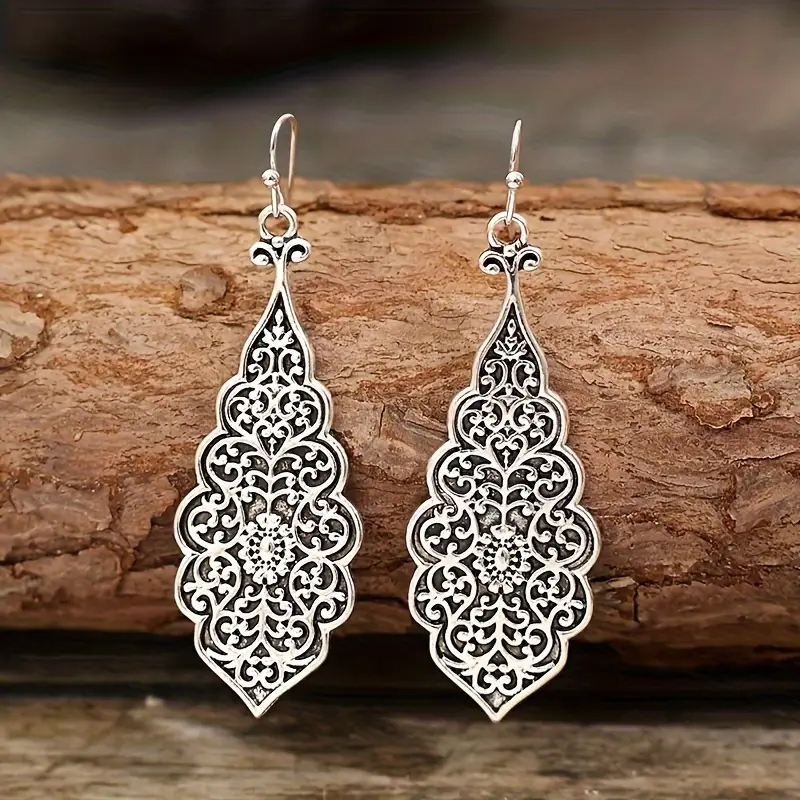 Vintage metal filigree earring