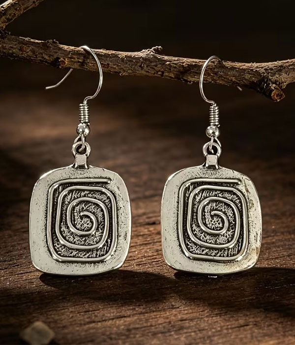 Tribal spiral dangle earring