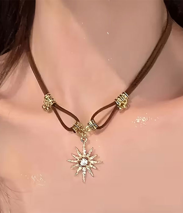 Sunburst pendant suede cord necklace
