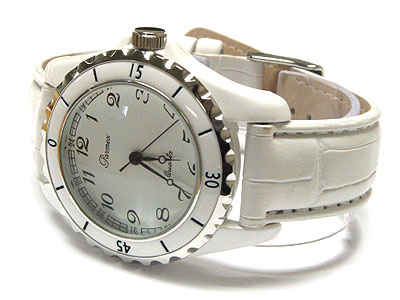 Enameled metal round face and leather band watch
