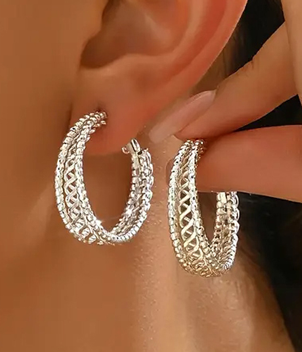 Carved hoop earring