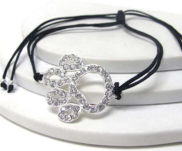 Crystal paw print and braided yarn friendship bracelet