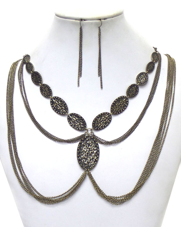 Multi chain and textured metal oval link necklace earring set