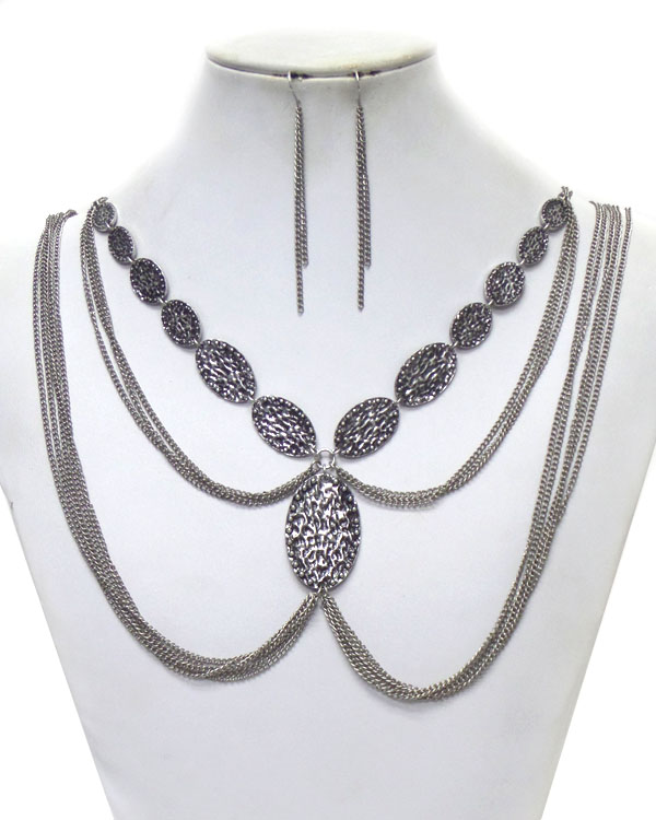 Multi chain and textured metal oval link necklace earring set