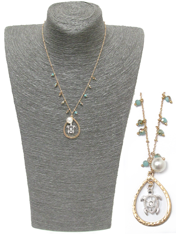 Turtle and pearl necklace