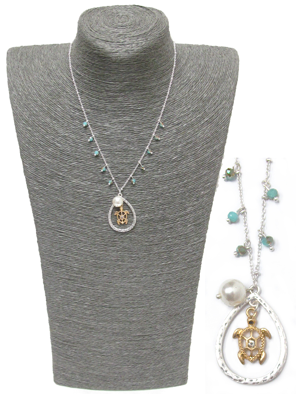 Turtle and pearl necklace