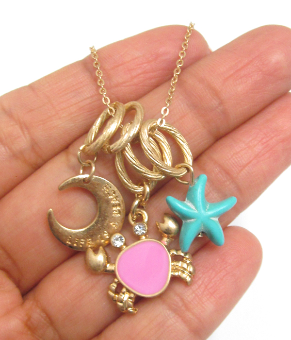 Starfish and crab charm necklace
