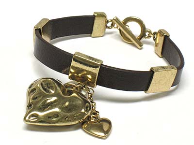 BURNISH METAL HAMMERED HEART CHARM AND GENUINE LEATHER BRACELET