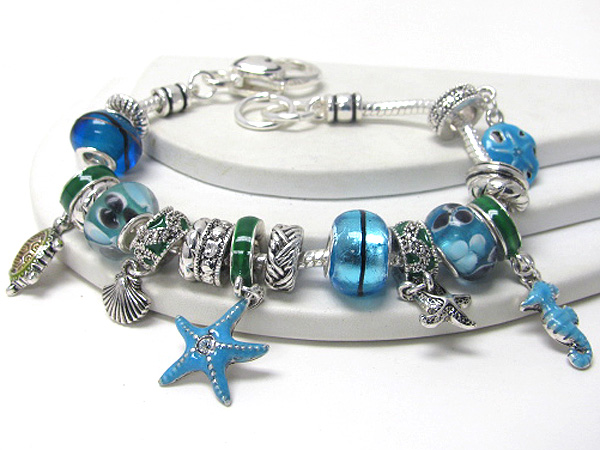 Multi metal and murano glass ring link sea life charm bracelet